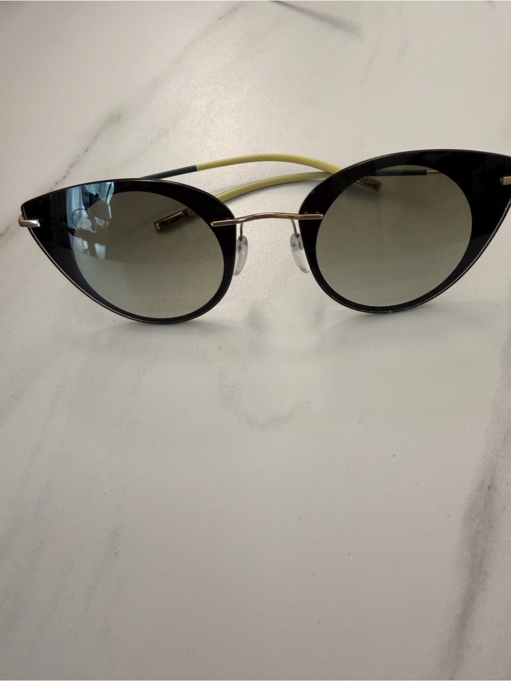 Silhouette Black Frame Sunglasses with Yellow Temples and Gold Bridge